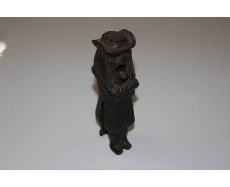 A 19th Century carved wooden nut cracker in the form of "The Huntsman"