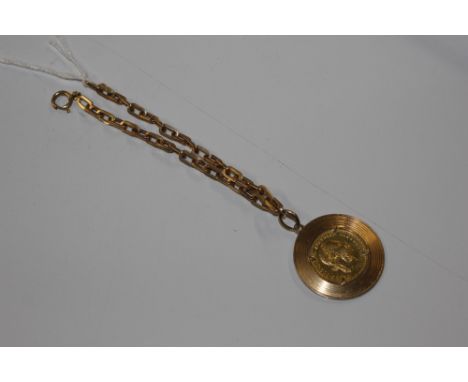 A 1915 Austrian Ducat gold coin, in yellow metal mount hung to an 18ct gold chain, total weight approx. 20gms 
