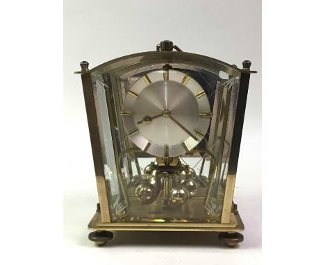 GERMAN MANTEL CLOCK, in a brass case16cm high