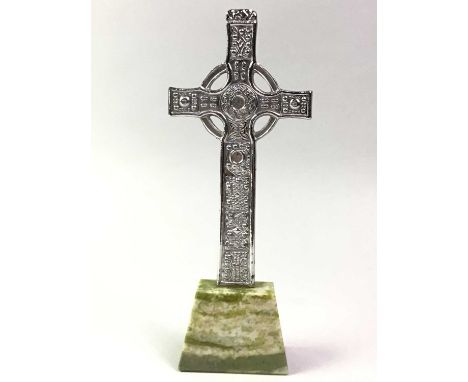 IONA CHROME CELTIC CROSS, DESIGNED BY ALEXANDER RITCHIE on green stone base20.5cm highThere are no marks to the side of the c