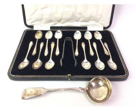 GEORGE V SET OF TWELVE TEASPOONS WITH TONGS, MAKER CJA, SHEFFIELD 1931 cased, along with an African style mask, a similar let
