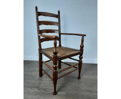 OAK LADDER BACK CHAIR, with rush seat and with turned supports107cm high