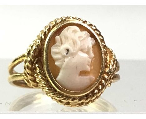 THREE DRESS RINGS, comprising an opal example marked 14K, along with a pearl and a cameo example, each unmarkedQty: 9g gross
