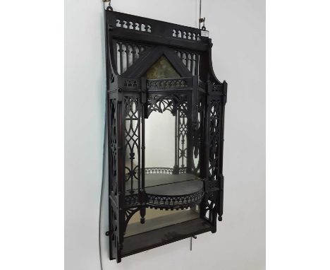 VICTORIAN EBONISED AESTHETIC WALL SHELF, with mirror back, pierced gallery and turned supports 92cm high, 44cm wideHas some s