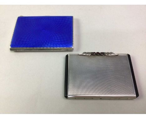 GEORGE V SILVER CIGARETTE CASE, ALONG WITH A SILVER COMPACT the cigarette case decorated in blue guilloche enamel, the compac