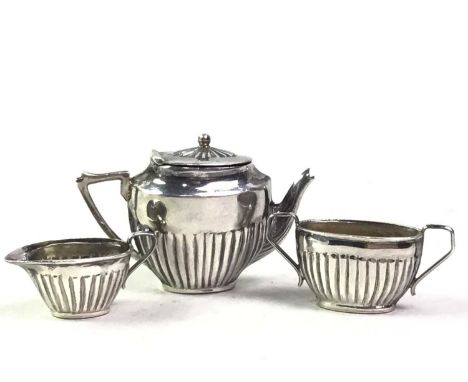MINIATURE SILVER THREE-PIECE TEA SERVICE, ALONG WITH FURTHER SILVER MINIATURES comprising two purses and a chair