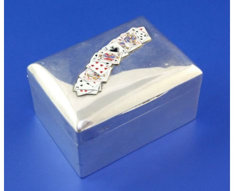 A late Victorian silver and enamel playing card box and cover by Stokes & Ireland Ltd, of rectangular form, the lid with appl