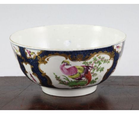 A Worcester scale blue 'fantastic birds' bowl, c.1775, the birds in gilt scrolled cartouches on a scale blue ground, open cre