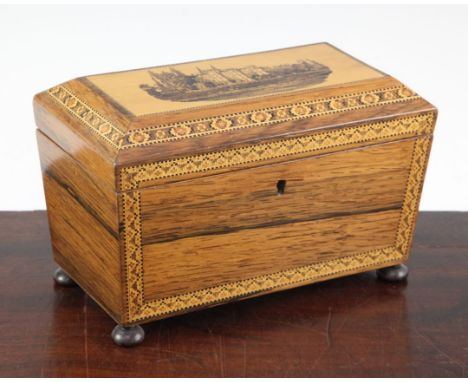 A Victorian rosewood Tunbridge ware tea caddy, the lid with a view of a castle, with two division interior, on bun feet, 8.25