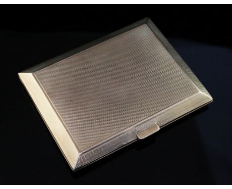 A late 1920's engine turned 9ct gold cigarette case by Asprey & Co, of rectangular form, with engraved Greek key border and i