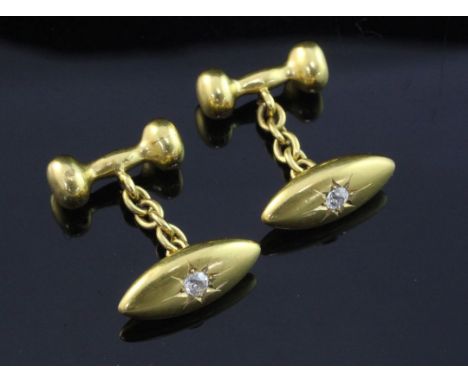 A pair of early 20th century 18ct gold and diamond set torpedo shaped cufflinks, maker, HG&S, gross weight 9.4 grams.