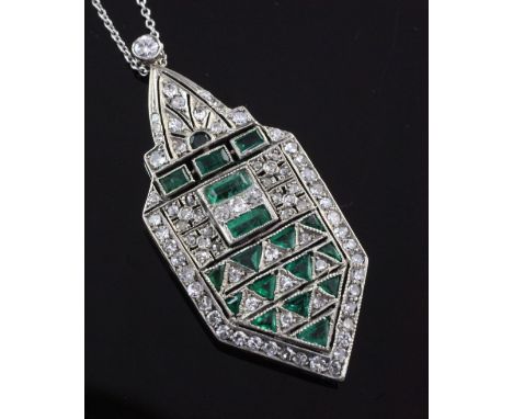 A 1930's/1940's Art Deco white gold, emerald and diamond pendant, of rectangular form with tapering terminals and set with tr