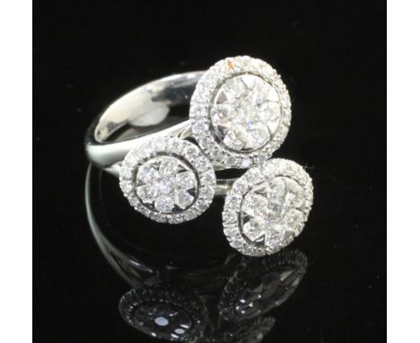A modern Italian 18ct white gold and diamond triple cluster ring, set with round brilliant cut diamonds, size N.
