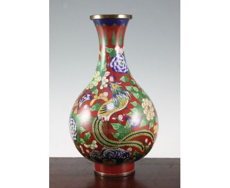 A Chinese cloisonne enamel pear shaped vase, Yuhuchunping, early 20th century, decorated with a phoenix amid peonies on a ter