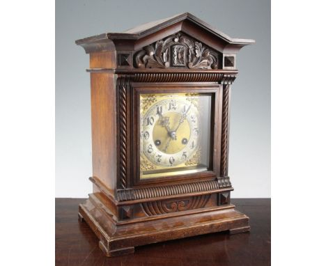 An Edwardian walnut mantel clock, in architectural case, 16in.
