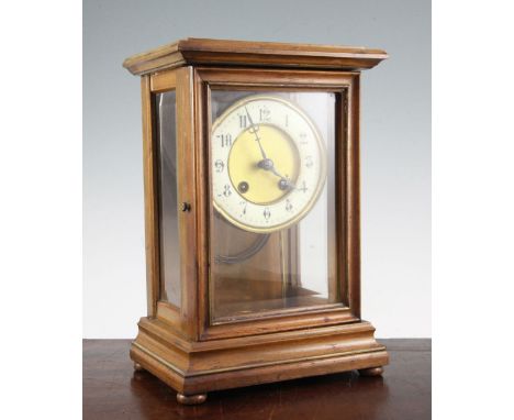 An early 20th century French walnut four glass mantel clock, 11.75in.