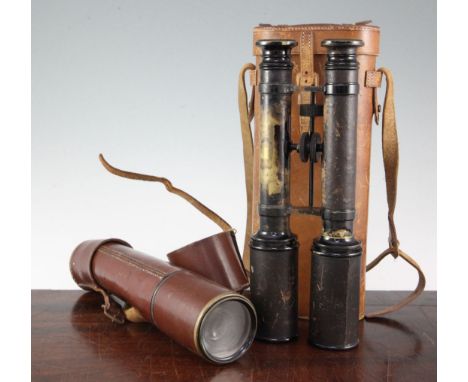 An unusual pair of adjustable binoculars, marked for JB Dancer Optician, 43 Cross Street, Manchester, with brown leather case