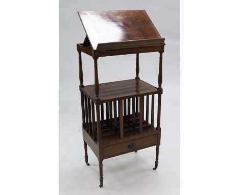 A Regency mahogany combined music canterbury whatnot, with rising top, mid tier and base divisions, with drawer, on ring turn