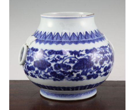 A rare Chinese blue and white two handled baluster vase, Zun, Qianlong period, applied with a pair of archaistic mask and rin