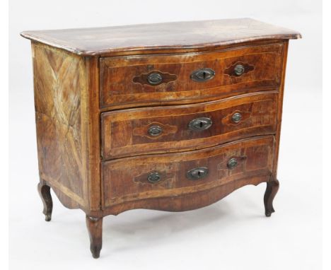 An 18th century Maltese walnut serpentine commode, fitted with three long drawers, with boxwood stringing on scroll supports,