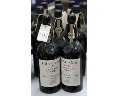 A nine bottle vintage port assortment including three Graham 1970, Oporto bottled in embossed bottles, proprietor labels, one