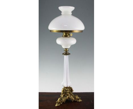 A late Victorian ormolu and opaline glass oil lamp, with white glass shade, overall 27.5in.
