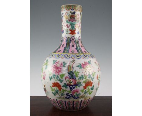 A large Chinese famille rose bottle vase, Daoguang period, painted with a pheasant and other birds amid flowers and foliage, 