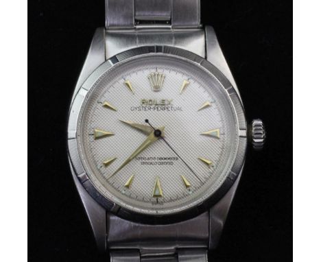 A gentleman's late 1950's stainless steel Rolex Oyster Perpetual wrist watch, with honeycomb dial and arrow baton numerals, m