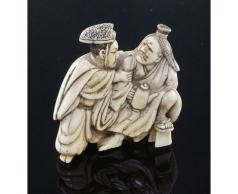 A Japanese ivory netsuke of Tadamori catching the oil thief, Edo period, some staining to their hair and hat, unsigned, 5.2cm