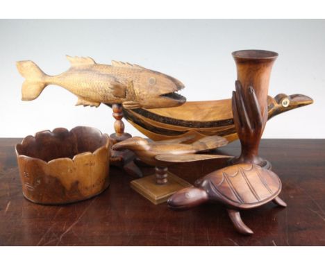 A collection of twenty one Pitcairn Islands souvenir carved hardwood models, including an HMS Bounty coconut ship diorama, th