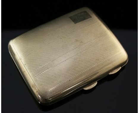 A George V engine turned 9ct gold cigarette case, of concave form, with interior inscription, William Neale & Son Ltd, Birmin