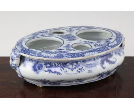 An unusual Chinese export blue and white oval desk stand, first half 18th century, with four circular apertures to the top an