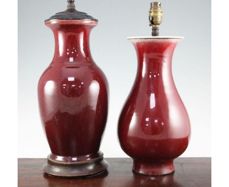 Two Chinese sang de boeuf baluster vases, 19th century, mounted as lamps, the first of pear shape, 32cm, the second of balust