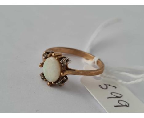An opal ring in 9ct size N