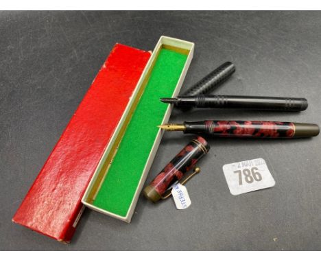 STEPHEN’S Red and Black marble 14ct nib together with a nib less vintage side lever pen