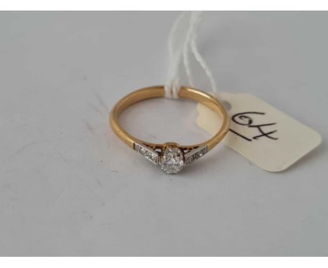 A vintage 18ct gold diamond solitaire with diamond shoulders size R 2.6g