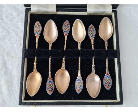 A set of six silver gilt and enamel foreign tea spoons