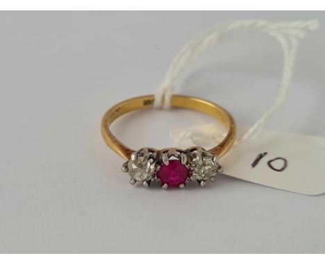 Ruby and diamond three stone ring 18ct size O. 2.4gms