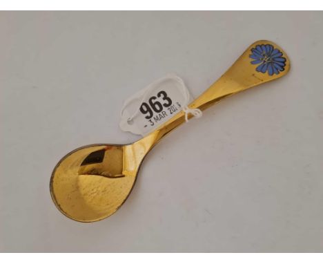 A silver gilt George Jenson spoon with enamel flower