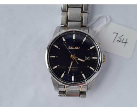 Large circular black faced kinetic 100M writ watch with seconds sweep,  date aperture