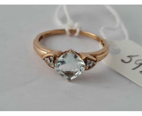 A topaz ring with diamond shoulders size R