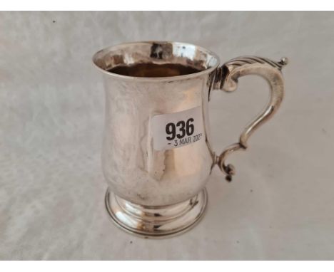 Early George III half pint mug with leaf capped handle . 4.5 inch high. London 1766 By R M 280gms