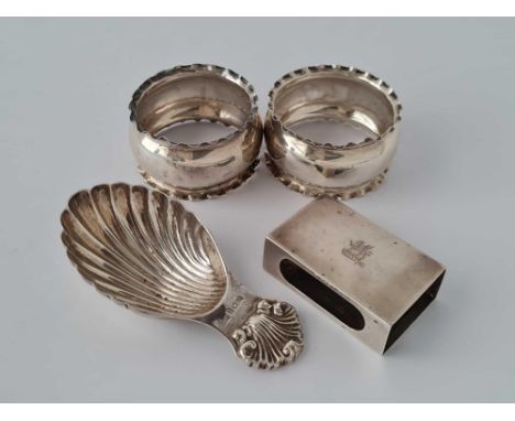 A match box holder, a shell decorated caddy spoon and a pair of napkin rings, 51g