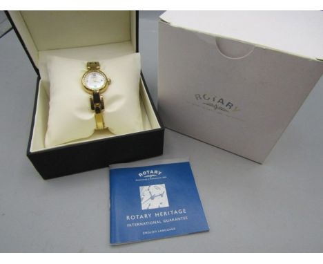 Rotary watch with pearlescent face and white stones in gift box