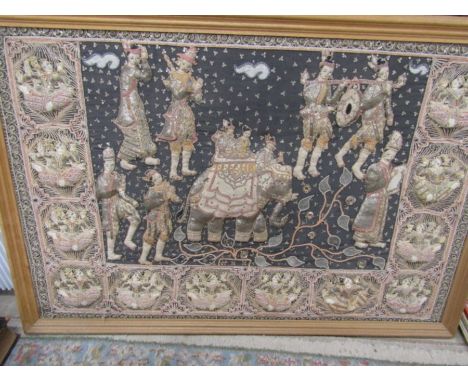 A large Indian tapestry in wooden frame with padded/3D elephants and characters 136x96cm