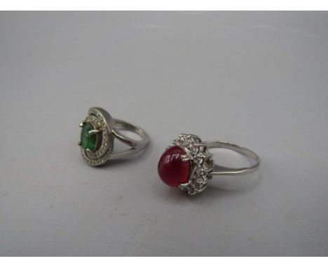 2 silver dress rings, one with heated Emerald and heated star ruby