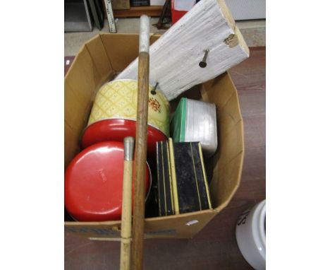 Vintage tins, walking canes and driftwood with boat nail hooks