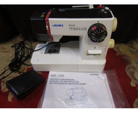 Juki electric sewing machine with manual