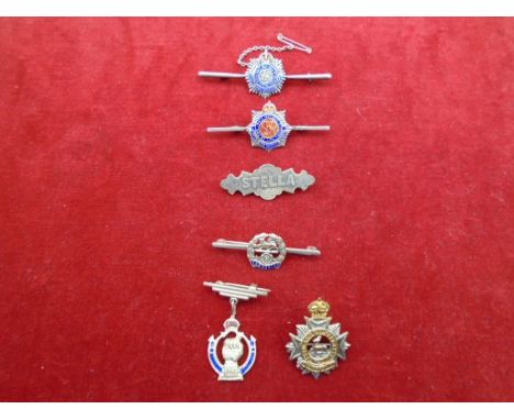 &nbsp;6 brooches 4 of which are silver, 'Stella' brooch hallmarked Birmingham 1911 by William Light, to include Royal Army Se