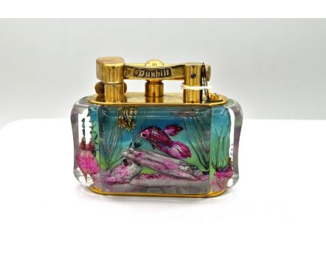 A Dunhill Aquarium table lighter:, each side with reverse painted intaglio fish and rock decoration on lucite&nbsp;panels, gi